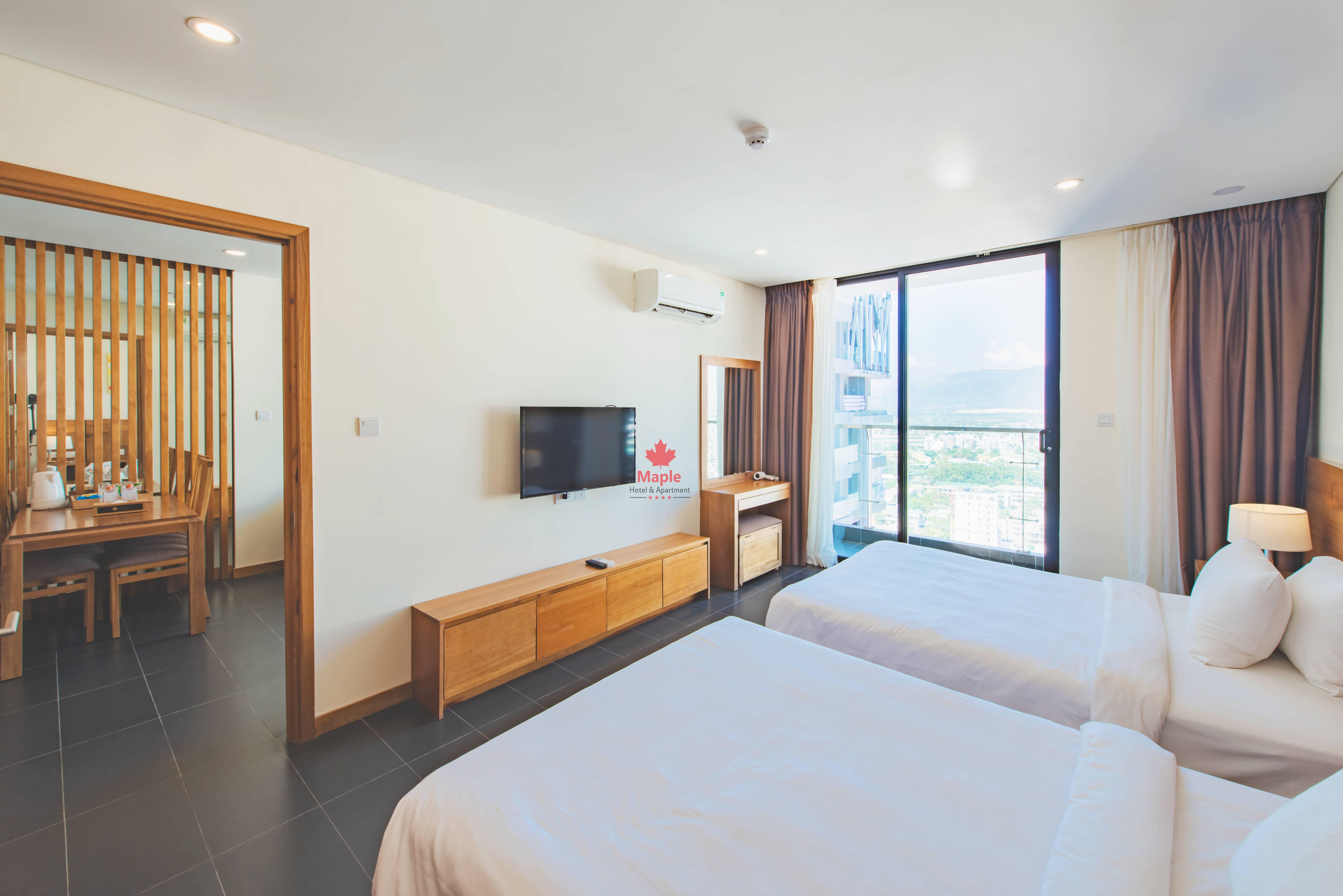 เมเปิล โฮเต็ล แอนด์ อพาร์ตเมนต์ Hotel ญาจาง ภายนอก รูปภาพ