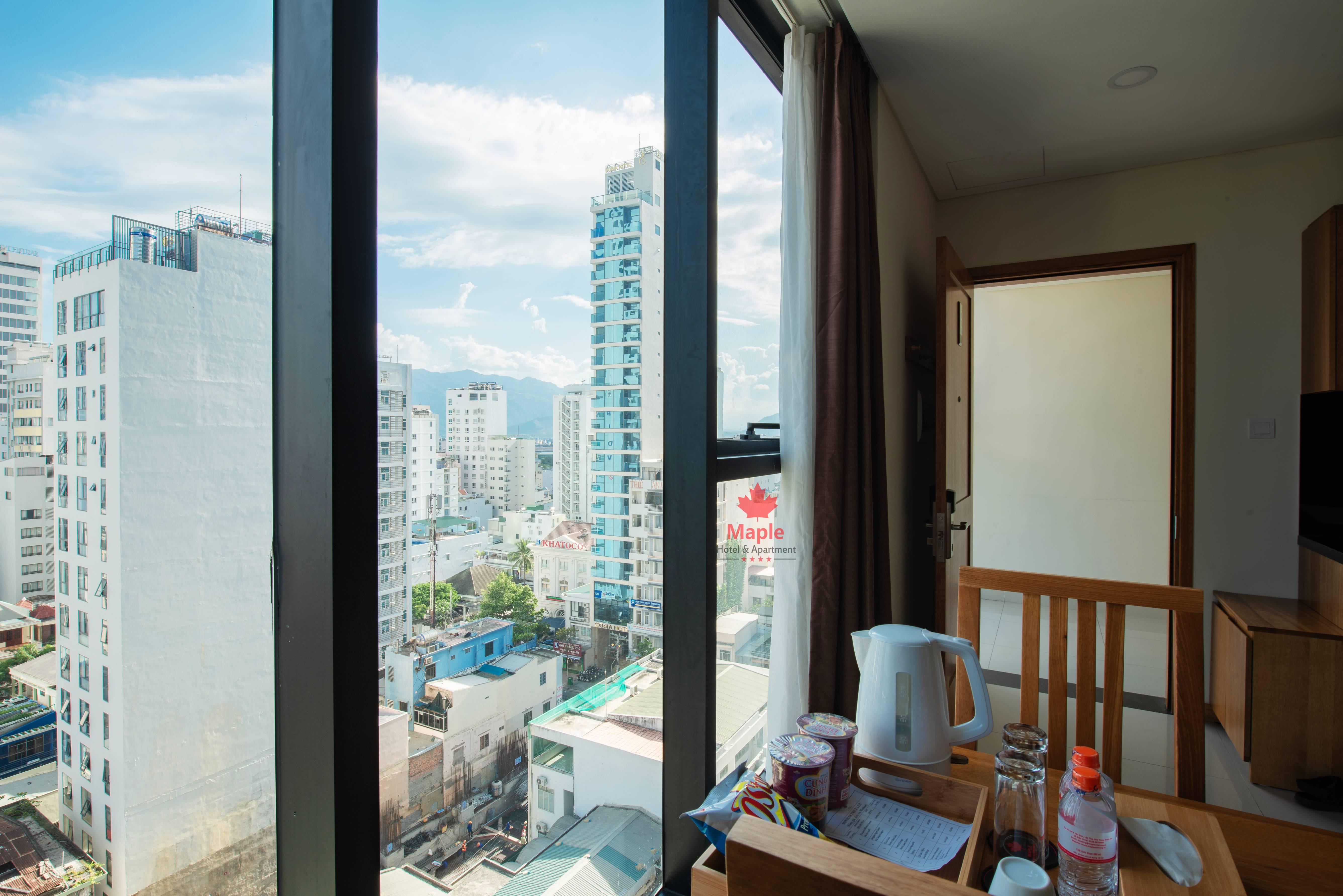 เมเปิล โฮเต็ล แอนด์ อพาร์ตเมนต์ Hotel ญาจาง ภายนอก รูปภาพ